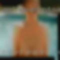 Naked woman shoves stuff